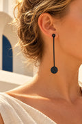 TUN CIRCLE DROP EARRINGS by Tun, worn on a model, cream editorial hero