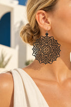 TUN FLAKE EARRINGS by Tun, worn on a model, cream editorial hero