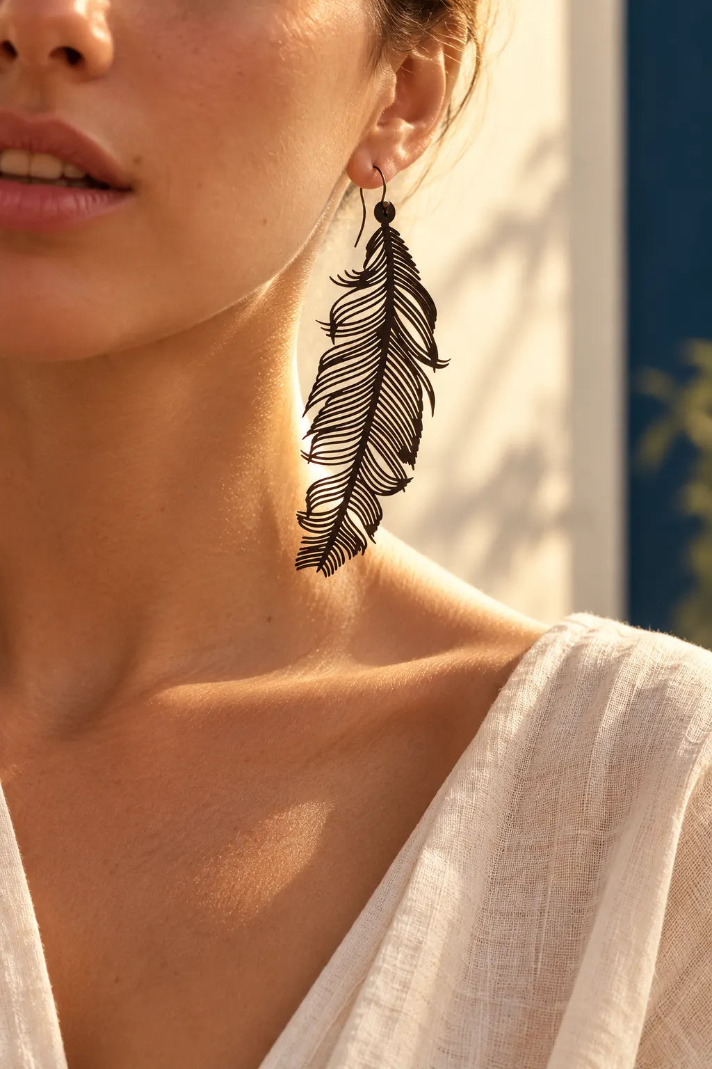 TUN PENA EARRINGS by Tun, worn on a model, cream editorial hero