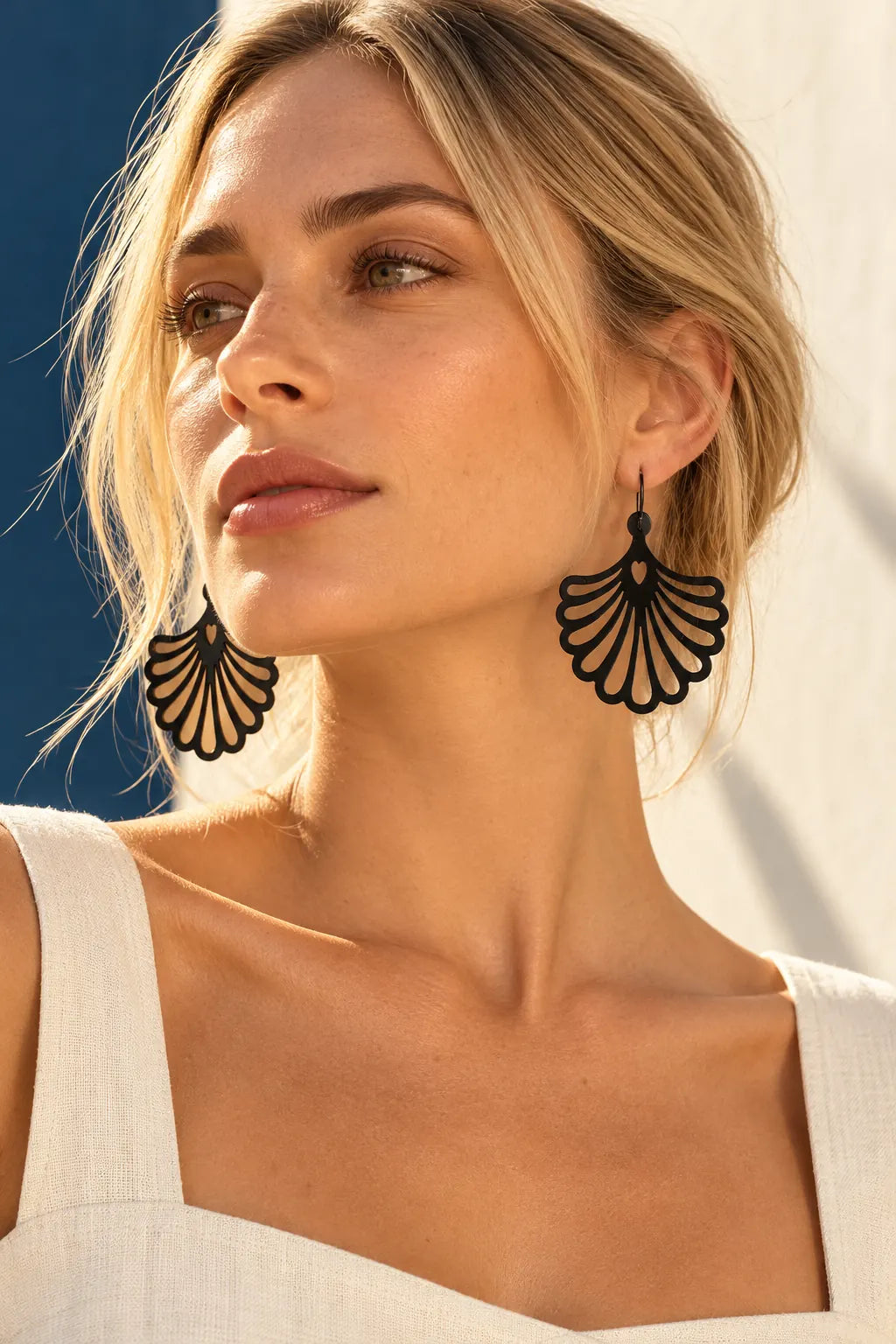 TUN LUXOR EARRINGS by Tun, worn on a model, cream editorial hero