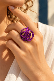 MONICA SCRUNCH RING by Monica Krexa, worn on a model, cream editorial hero