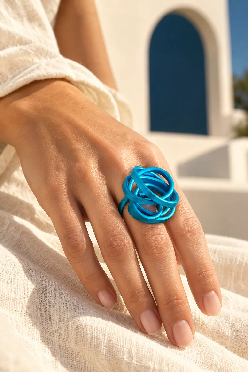 MONICA SCRUNCH RING by Monica Krexa, worn on a model, cream editorial hero