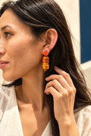 MONICA SWIRL EARRINGS by Monica Krexa, worn on a model, cream editorial hero