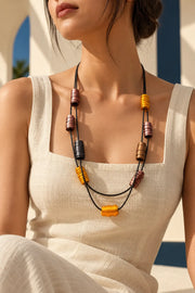 MONICA SWIRL NECKLACE by Monica Krexa, worn on a model, cream editorial hero