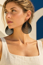 TUN NUBIA EARRINGS by Tun, worn on a model, cream editorial hero