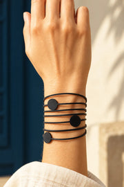 TUN PINA BRACELET by Tun, worn on a model, cream editorial hero